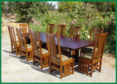 Shown with both leaves installed and ten dining chairs.